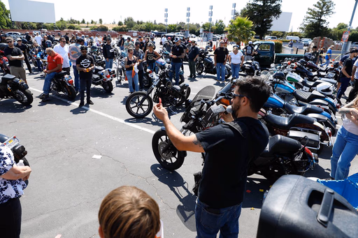 Crowd browsing motorcycles